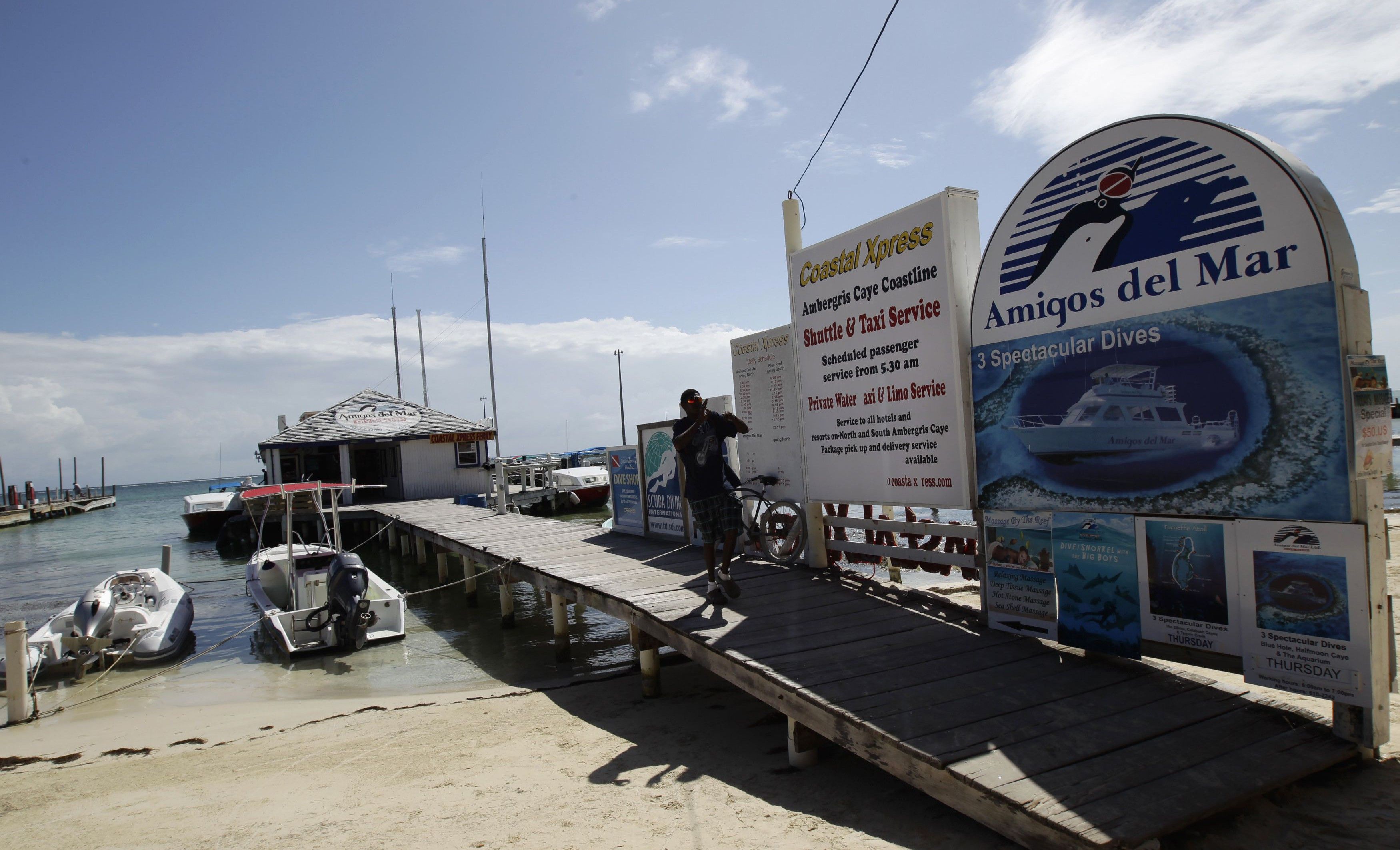A Florida man leaves a dock near the main square in San Pedro, Belize, November 15, 2012.