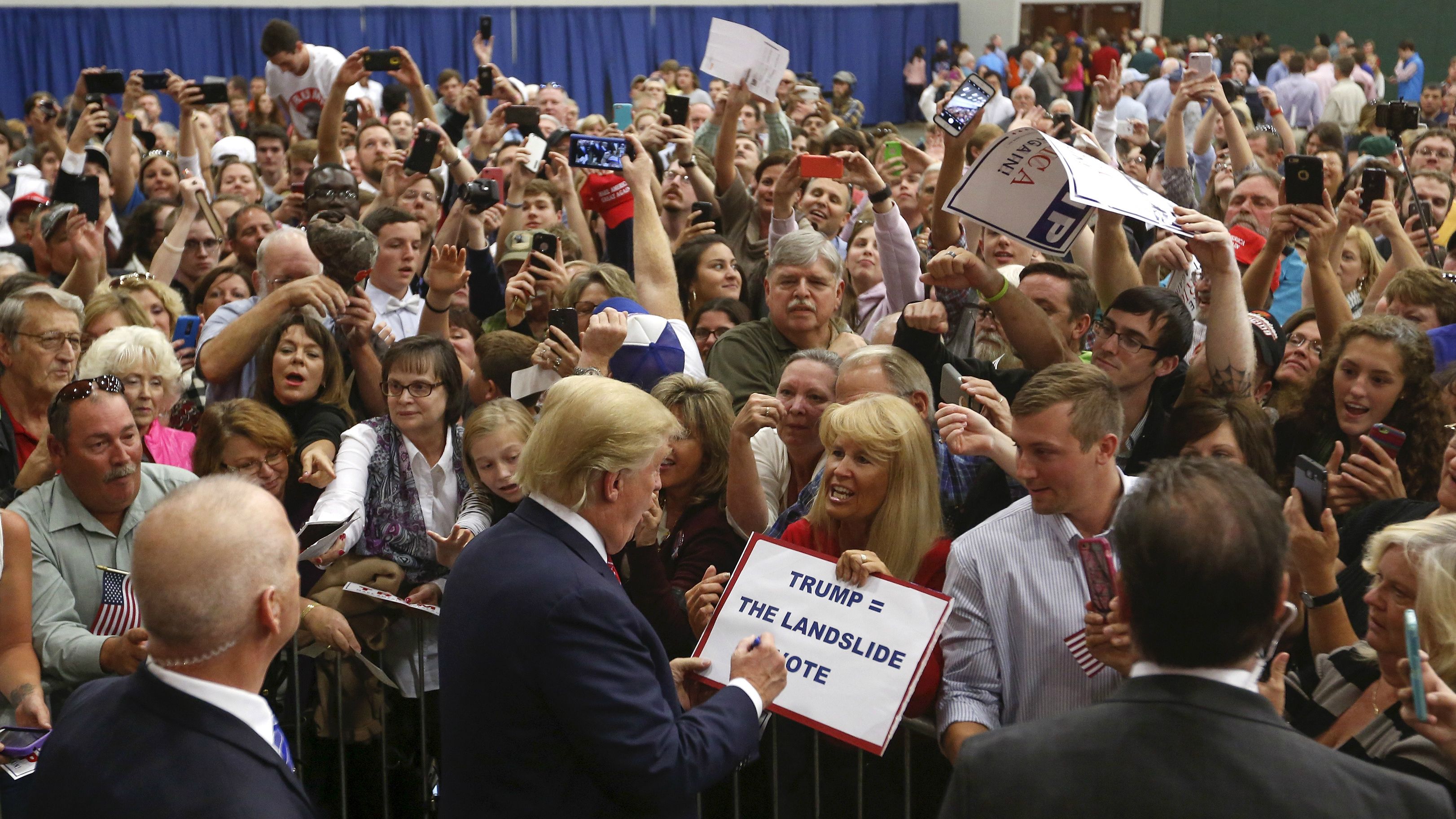 "Trump = The Landslide Vote," reads a sign at a rally in Anderson, South Carolina.