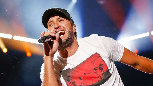 Can Luke Bryan keep the national anthem under 2:15 on Sunday? He clocked in at 1:59 when he sang "The Star-Spangled Banner" at the 2012 MLB All-Star game. (AP file)