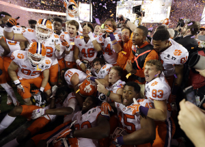 Clemson players celebrate after the NCAA college football playoff championship game against Alabama Tuesday, Jan. 10, 2017, in Tampa, Fla. Clemson won 35-31. (AP Photo/Chris O'Meara)