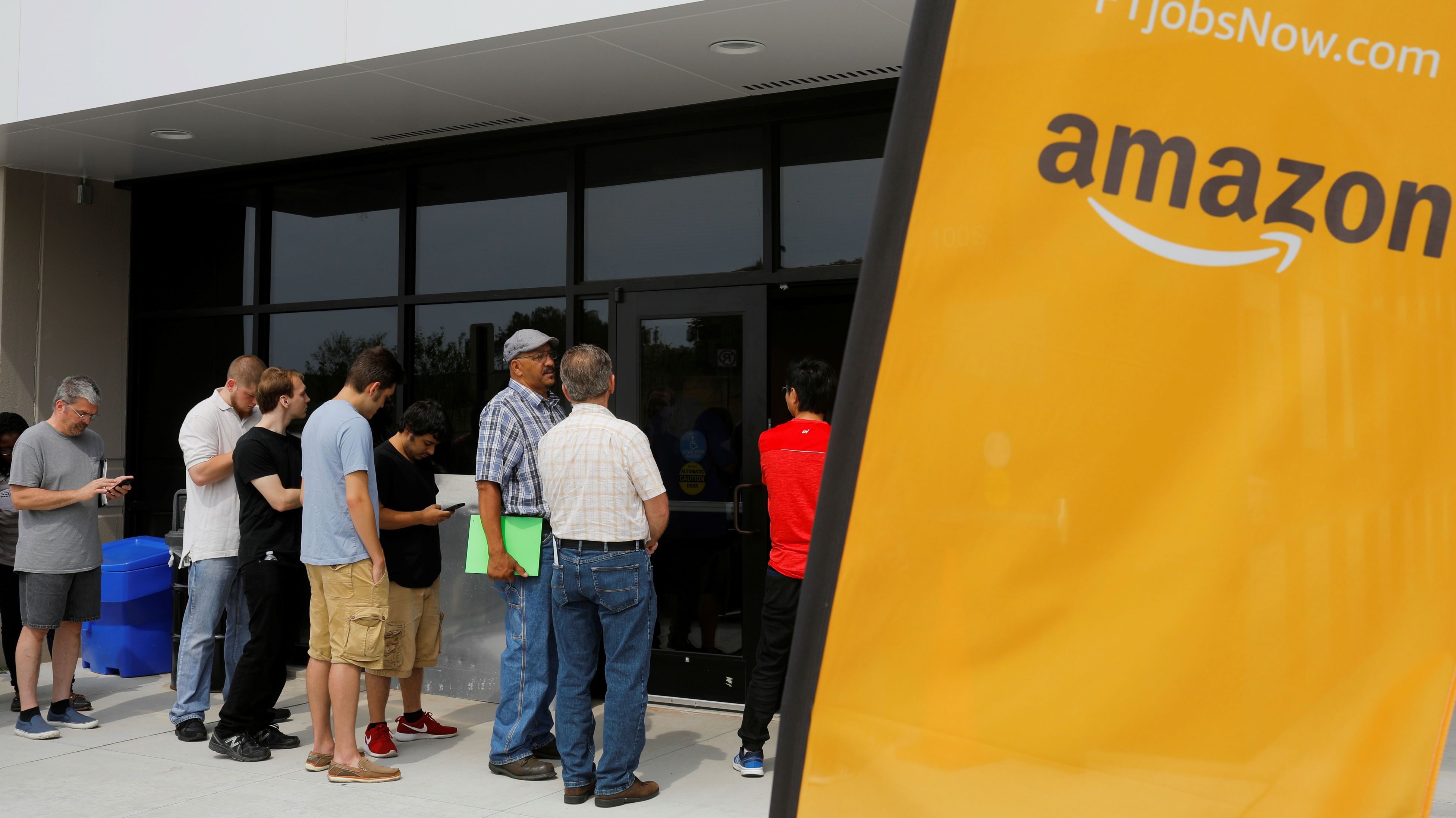 Job seekers line up to apply during "Amazon Jobs Day."